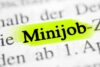 Hervorgehobener Text mit der Aufschrift „Minijob“ in einem gedruckten Dokument, möglicherweise ein Hinweis auf einen Abschnitt über Teilzeitbeschäftigung oder geringfügig entlohnte Beschäftigung in Deutschland.