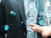 Eine Person interagiert mit einer futuristischen digitalen Schnittstelle mit schwebenden blauen Knoten und Linien, die fortschrittliche Technologie oder virtuelle Konnektivität suggerieren.
