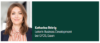 Eine Frau mit schulterlangen braunen Haaren, einer gestreiften Bluse und einem dunklen Blazer lächelt in die Kamera. Auf dem grünen Hintergrund rechts von ihr steht der Text „Katharina Röhrig Leiterin Business Development bei GFOS, Essen.“